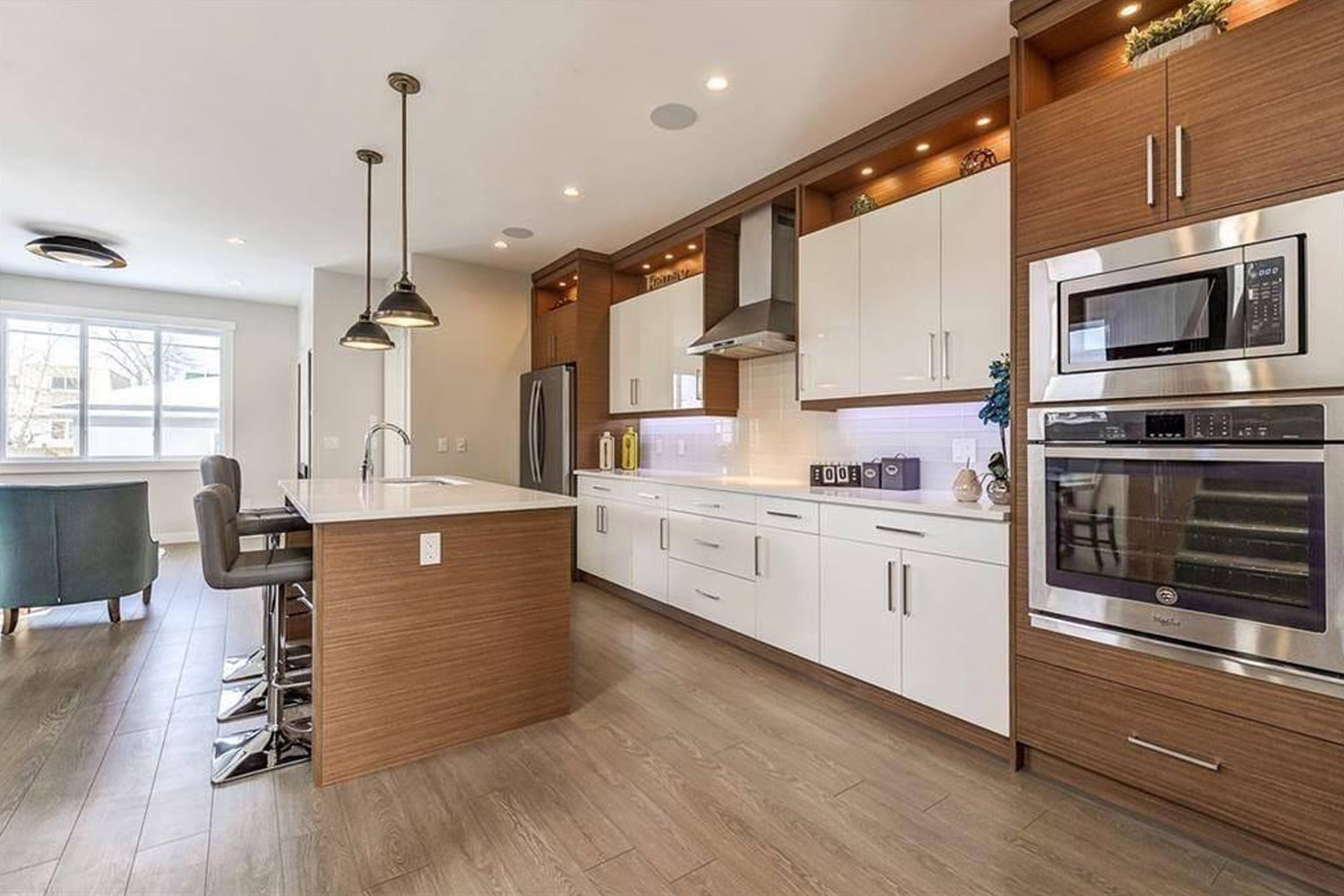 Luxury kitchen renovation with marble waterfall island