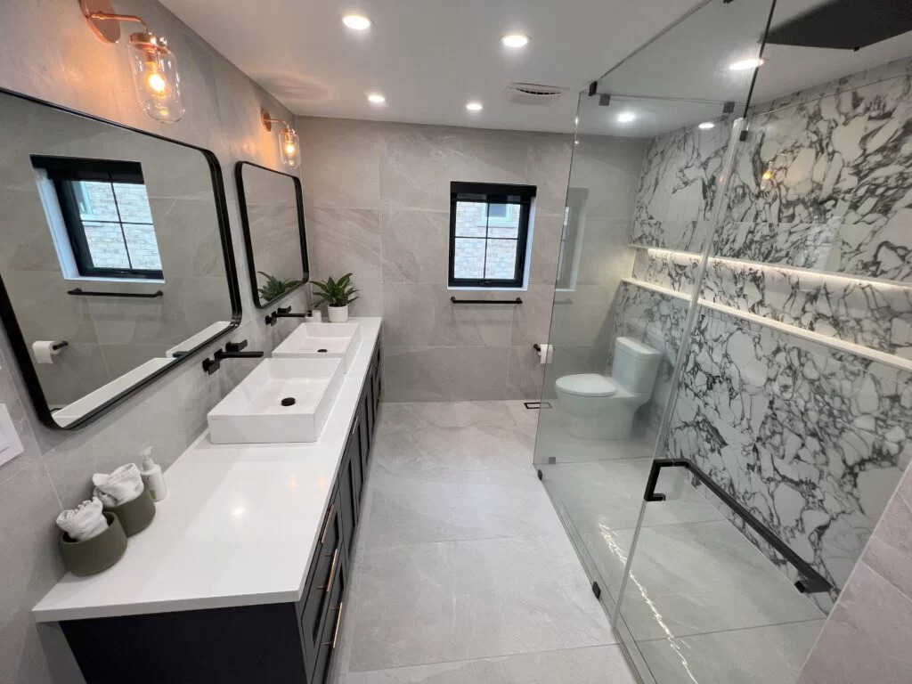 Modern bathroom with marble feature wall
